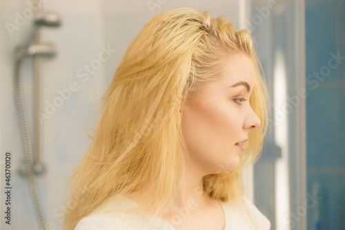 Woman with wet blonde hair
