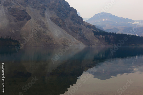Beautiful Bow Lake in Banff National Park, Alberta. Shot during the summer of 2021 when wildfires caused very hazy conditions.