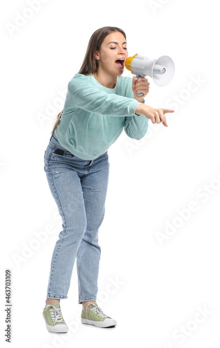 Young woman shouting into m...