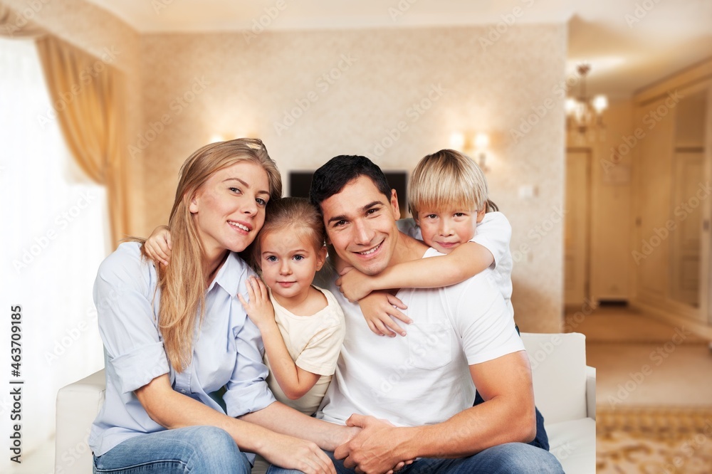 Family with little child resting in living room