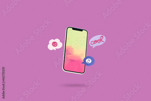 smartphone and multi-color speech bubbles paper