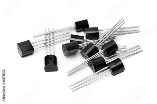 several TO92 type transistors on white background