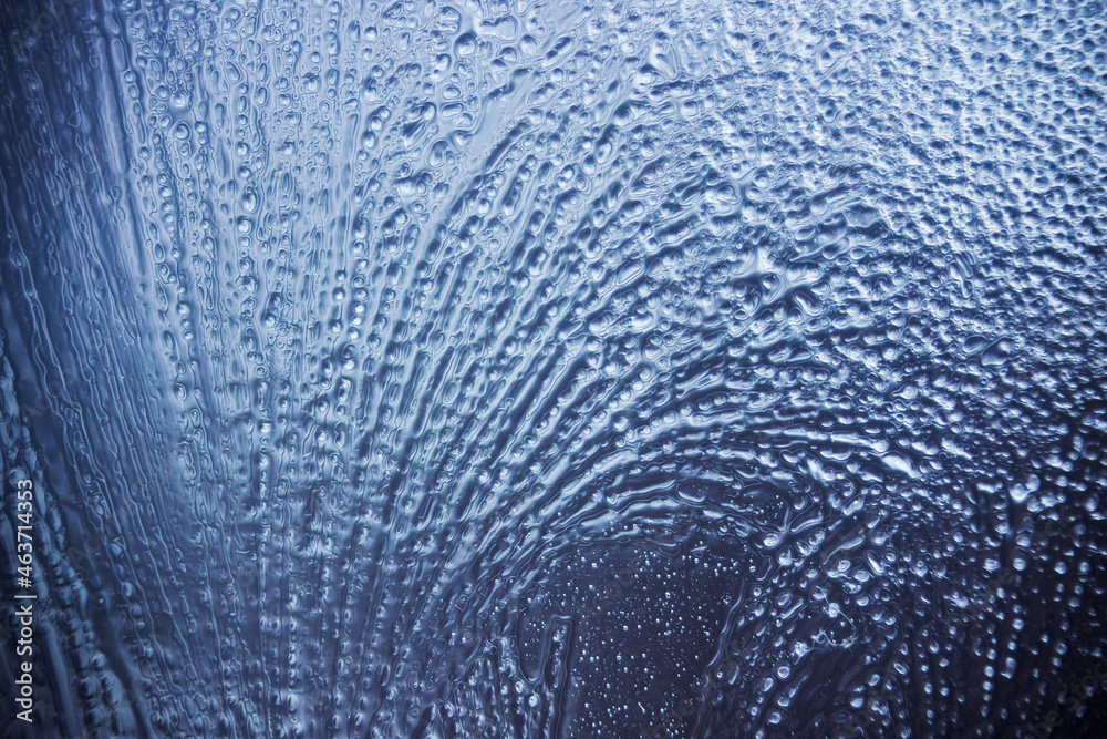 Ice texture bacground. All shades of blue and cold colors.