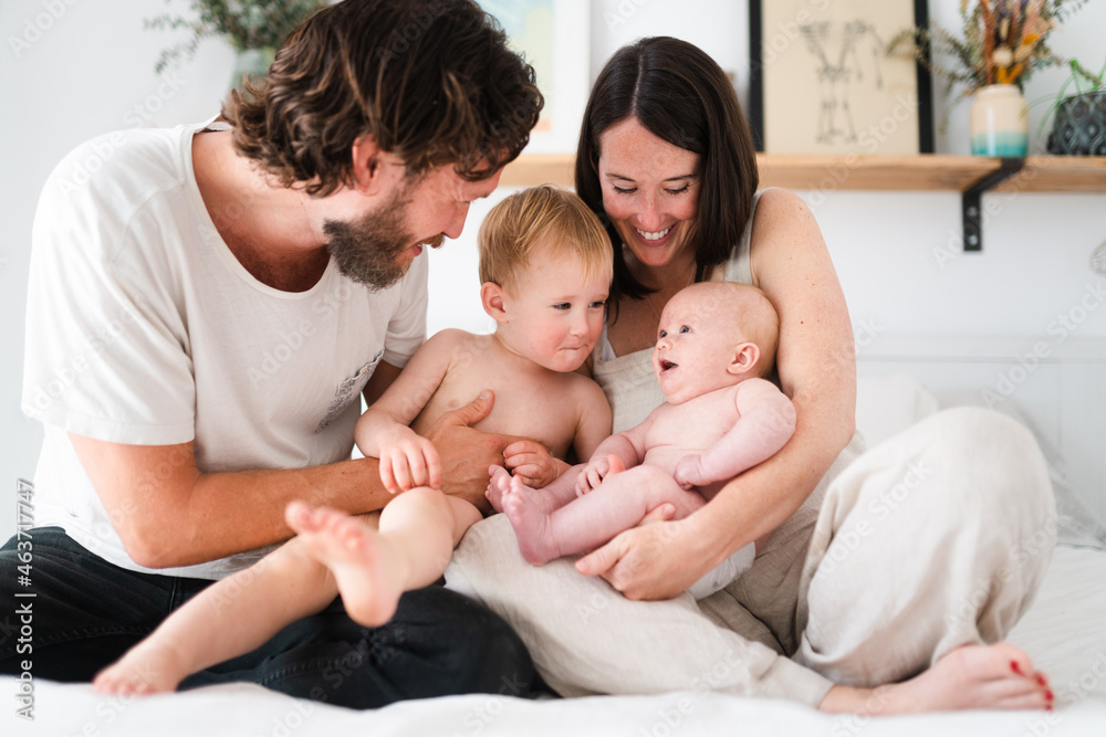 Family hanging out in bed Family hanging out in bed