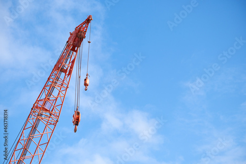 Large industrial crane masts at gas site photo