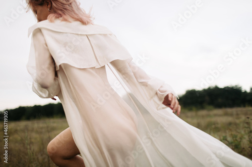 Carefree woman in white dress