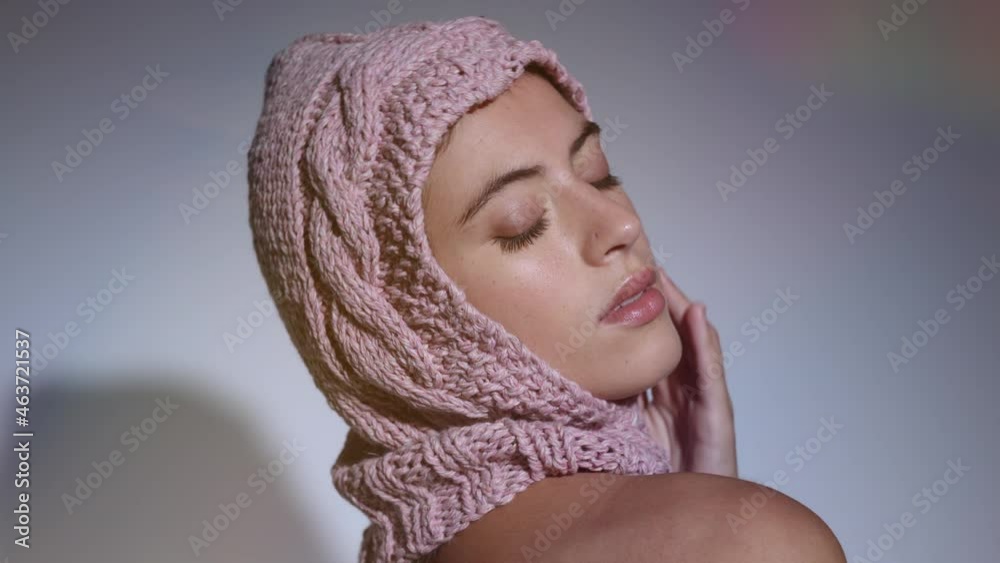 Woman posing and dancing in knitwear hat Woman posing and dancing in knitwear hat