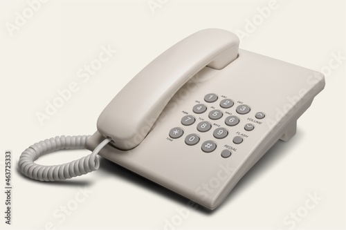 vintage dial-up digital desk phone on the office table
