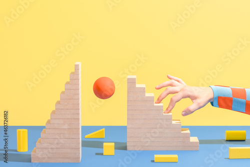 Hand climbing wooden stairs