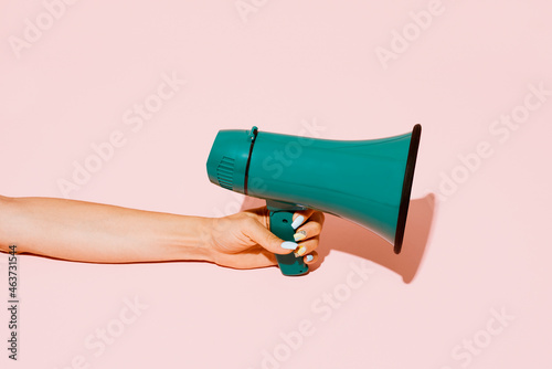 woman with a megaphone in her hand photo