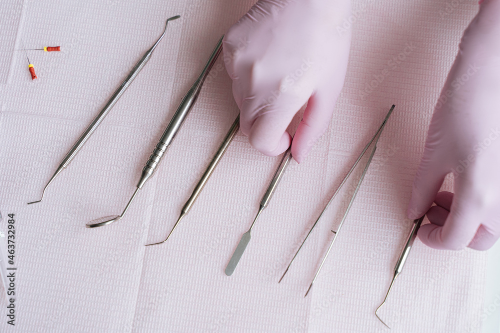 doctor's hands lay out medical instruments doctor's hands lay out medical instruments