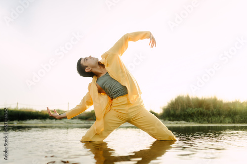 Contemporary dancer moving in nature photo