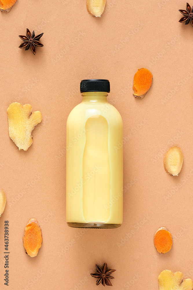 Turmeric drink milk with cinnamon in a glass bottle Turmeric drink milk with cinnamon in a glass bottle