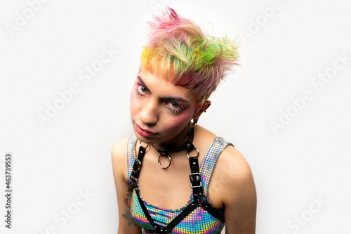 Woman in a punk rock style standing looking at camera