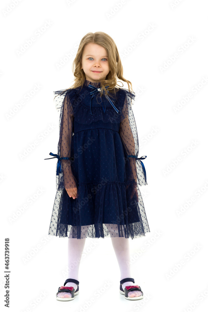 Cute little serious girl posing with arms crossed Cute little serious girl posing with arms crossed