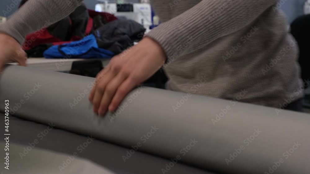 Working with a roll of waterproof fabric Working with a roll of waterproof fabric