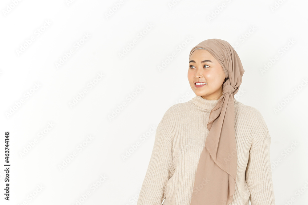 Standing and Looking aside Beautiful Asian Woman Wearing Hijab Isolated On White Background Standing and Looking aside Beautiful Asian Woman Wearing Hijab Isolated On White Background