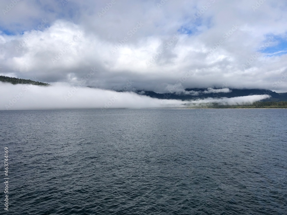 Low clouds over the ocean on Vancouver Island. Pacific ocean near Port Renfrew in Canada