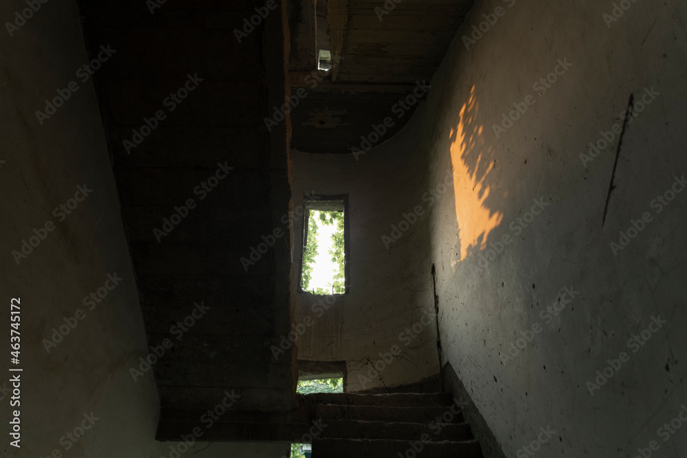 An abandoned building window