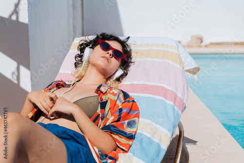 Headphones and relax in summer photo