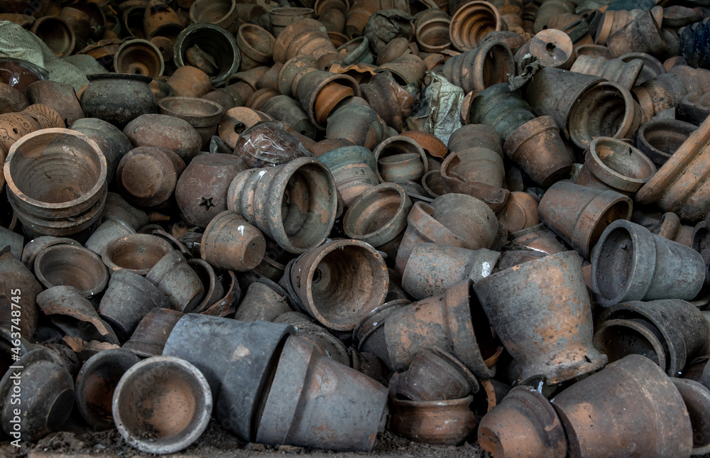 Clay pottery in Ancient furnace, Pottery textured background, Thailand. Selective focus.
