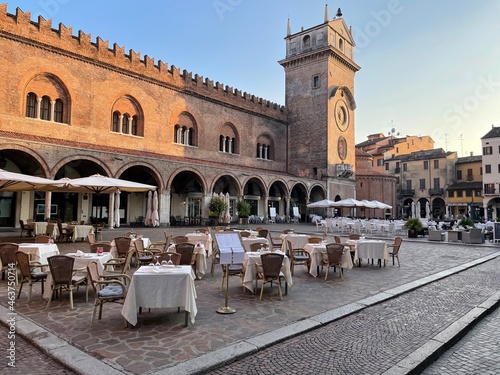 Piazza delle Erbe with historical palaces and church, Mantova, Italy photo