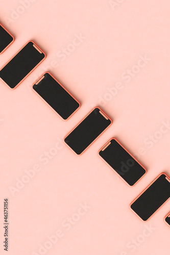 Mobile phones products on pink