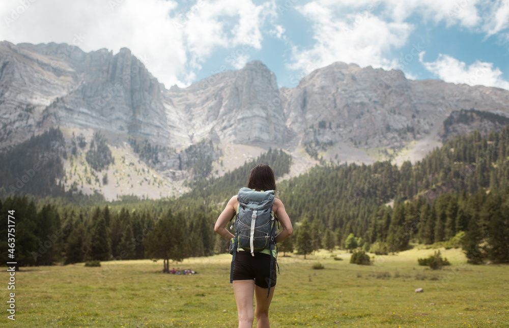 Female hiker walking on the mountain Female hiker walking on the mountain