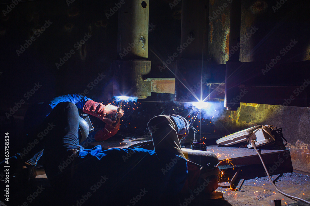 Welding male two horizontal position worker metal arc part in tank nozzle pipeline construction