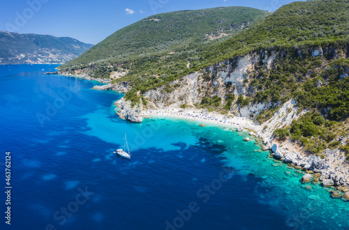 Aerial drone photo of iconic paradise sandy beach of Agiofili near port of Vasiliki with emerald crystal clear sea and sail boats docked  Lefkada island  Ionian  Greece