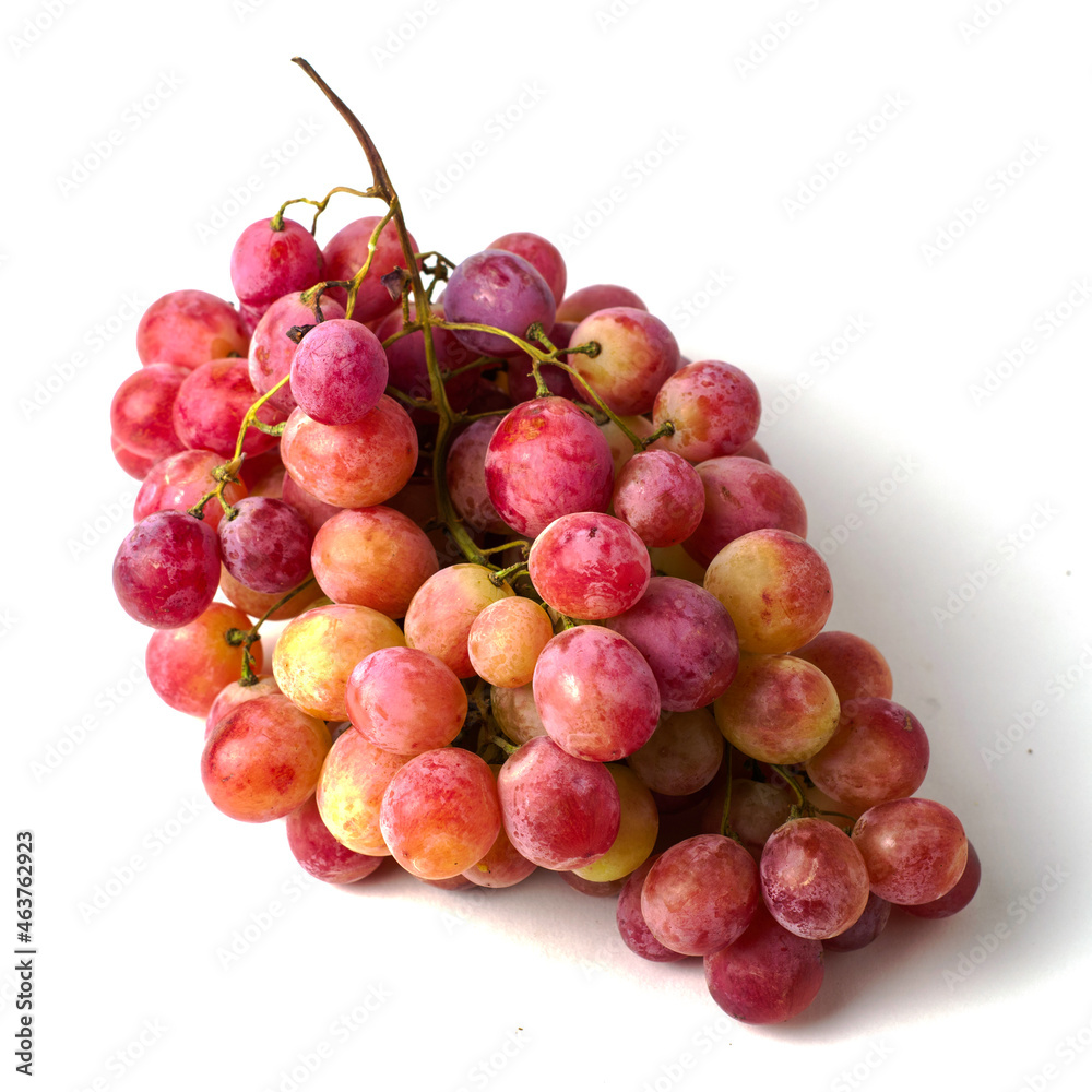a brush of table pink grapes on a white background