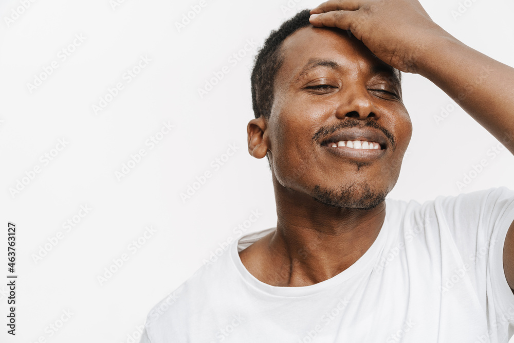 Obraz premium Portrait of a smiling mid aged african man