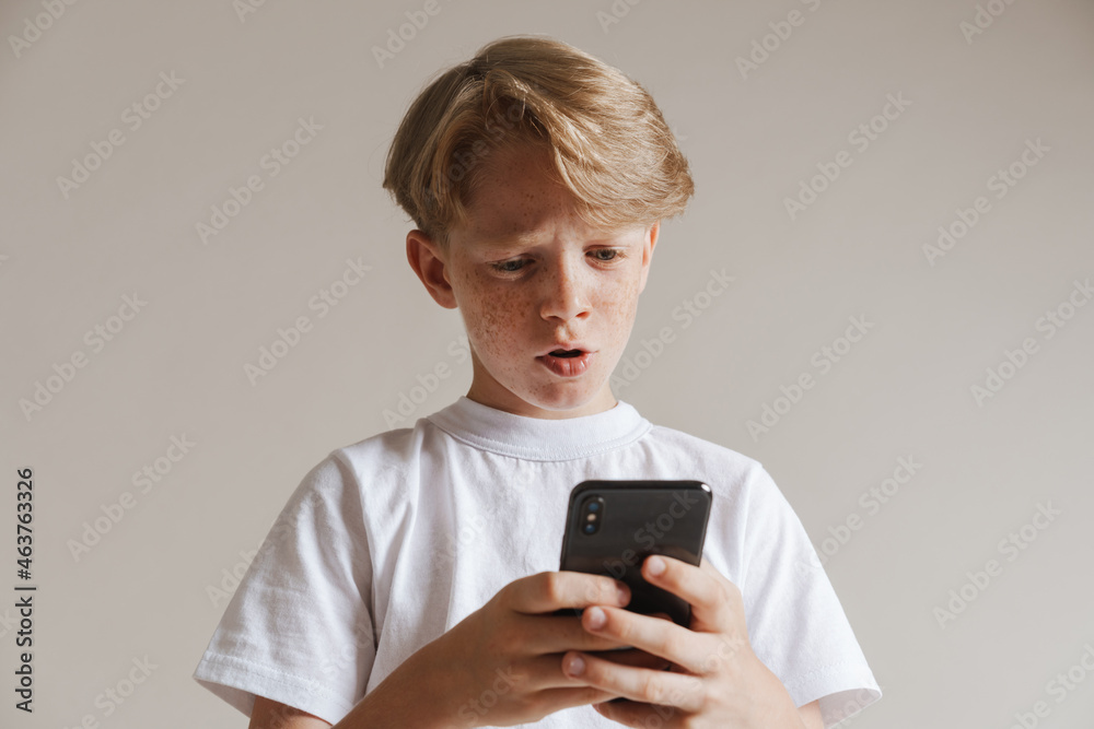 Portrait of a casual preteen boy in t-shirt standing Portrait of a casual preteen boy in t-shirt standing
