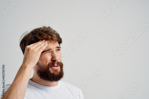 bearded man health problems migraine stress disorder isolated background
