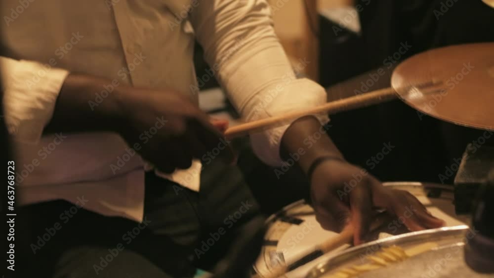 Black African Man playing drum kit in slow motion at a Party in Ghana Black African Man playing drum kit in slow motion at a Party in Ghana