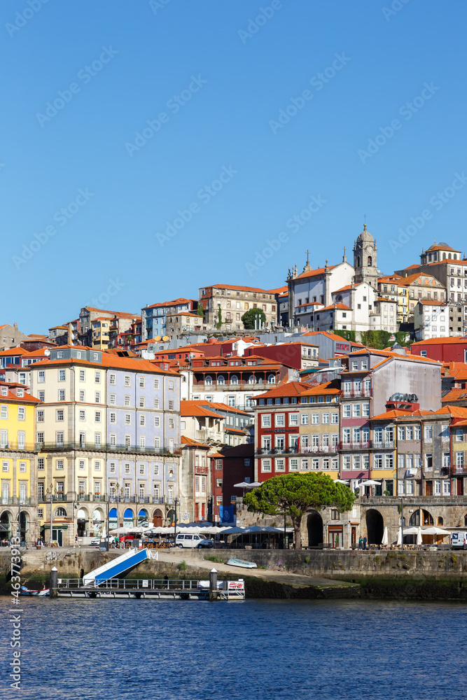 Porto Portugal old town buildings World Heritage with Douro river travel portrait format