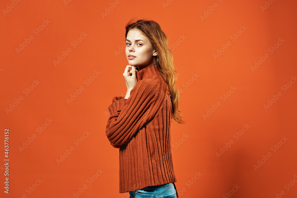 woman in red sweater fashion studio posing red background woman in red sweater fashion studio posing red background