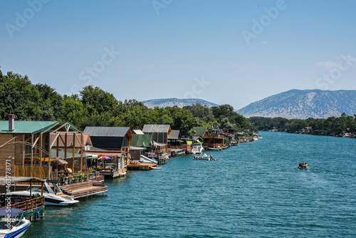ADA BOIANA , MONTENEGR, Bojana River is a popular tourist destination with traditional seafood restaurants photo