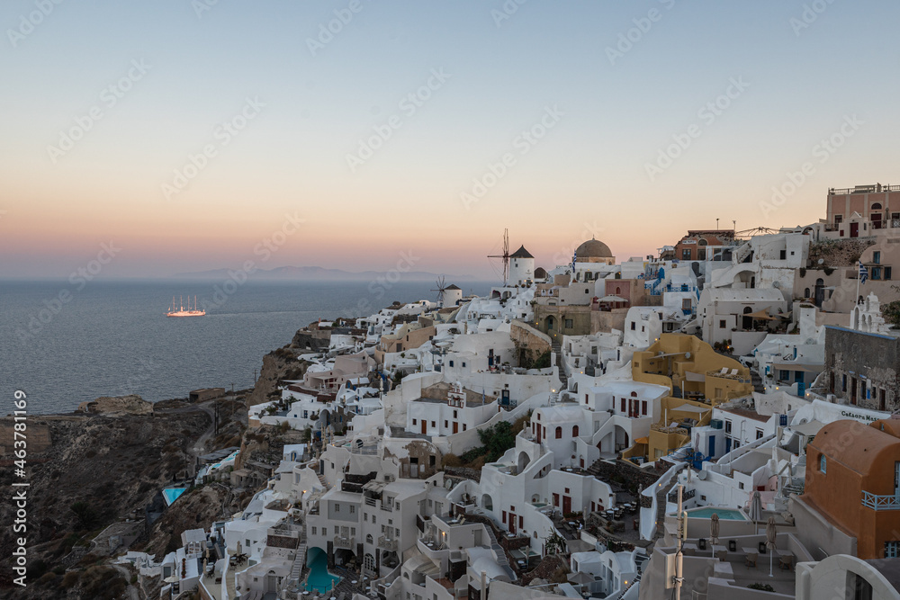 Sunset landscapes of the village Oia in Santorini Island in Greece