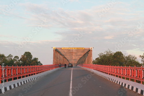 View of Kahayan Bridge. It crosses the Kahayan river connecting Palangkaraya (Central Kalimantan, Indonesia) with the surrounding districts on the other side of the river. photo