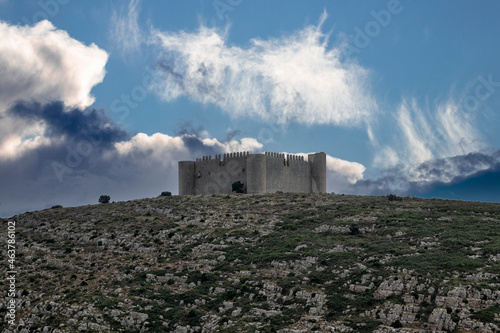castle on top of a mountain in torroella de montgri on the costa brava of girona photo