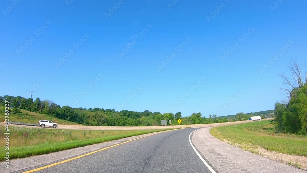 Driving on entrance ramp onto Interstate 80 heading towards the Schwengel Memorial Bridge over the Mississippi River near LeClaire Iowa Driving on entrance ramp onto Interstate 80 heading towards the Schwengel Memorial Bridge over the Mississippi River near LeClaire Iowa
