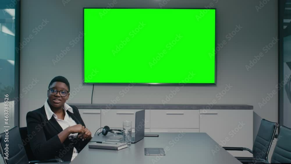 Young Black Businesswoman Making Presentation In Conference Room With Chroma Key Tv Young Black Businesswoman Making Presentation In Conference Room With Chroma Key Tv