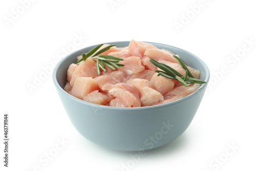 Bowl with raw chicken fillet slices isolated on white background