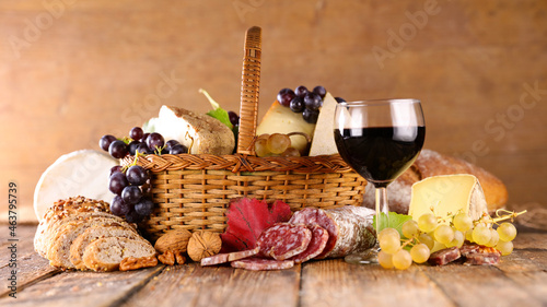 red wine glass with cheese and bread