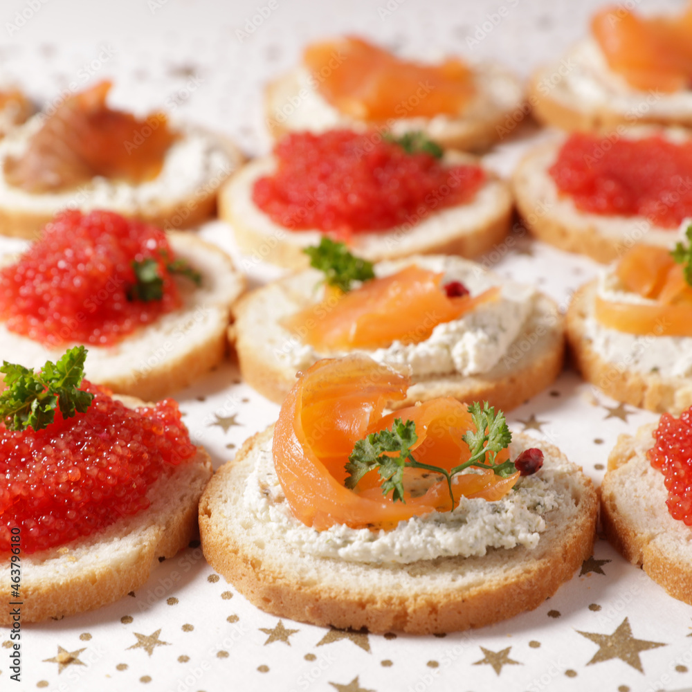 canape, buffet food, bread toast with cream cheese and smoked salmon canape, buffet food, bread toast with cream cheese and smoked salmon