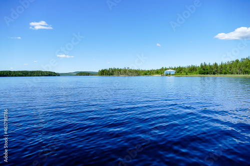 landscape with lake and blue sky, in Sweden Scandinavia North Europe photo