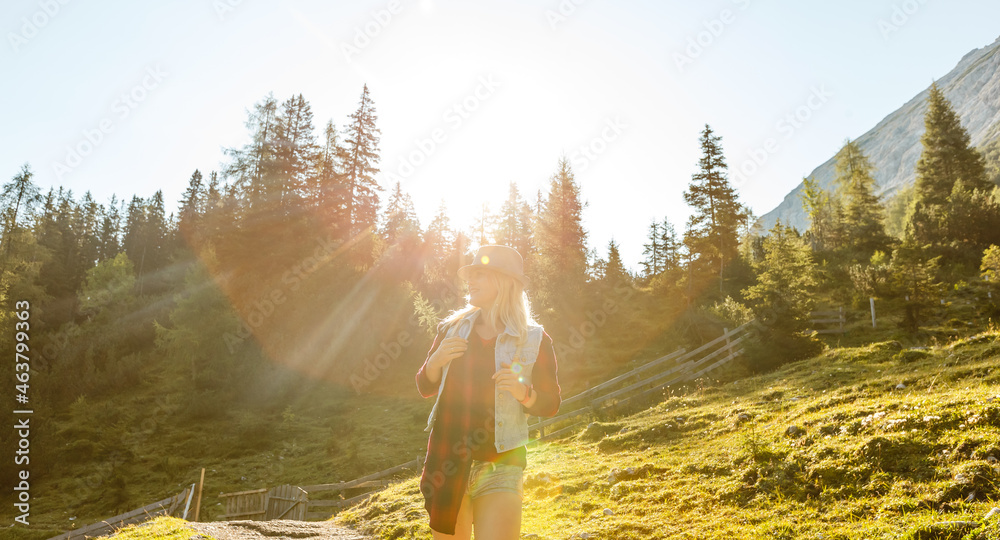 Young beautiful woman traveler , mountains Alps background, - obrazy, fototapety, plakaty 