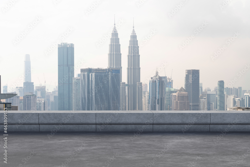 Fototapeta premium Panoramic Kuala Lumpur skyline view, concrete observatory deck on rooftop, daytime. Asian corporate and residential lifestyle. Financial city downtown, real estate. Product display mockup empty roof
