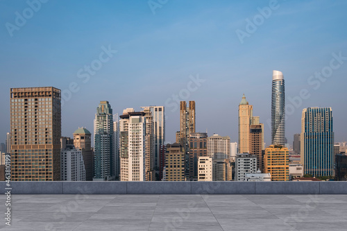 Panoramic Bangkok skyline view, concrete observatory deck on rooftop, sunset. Luxury Asian corporate and residential lifestyle. Financial city downtown, real estate. Product display mockup empty roof © VideoFlow